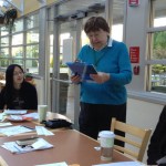 Norma gives feedback on members' use of the English language