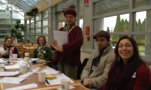 Mary stands to address the club