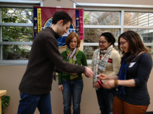 Scott presents membership pins to new members