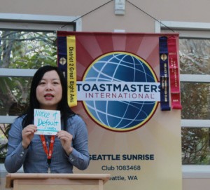 Jun Lei incorporates visual aids in her speech