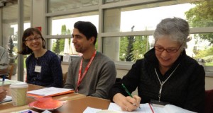 Members wait for the meeting to start