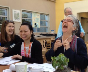 Members laugh at a humorous comment