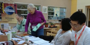 Madeleine demonstrates how to use a mandolin