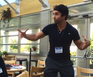 Peter incorporates gestures into his speaking