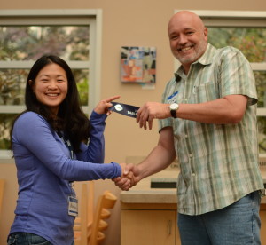 Clint awarded Best Table Topics ribbon from acting President Aanya